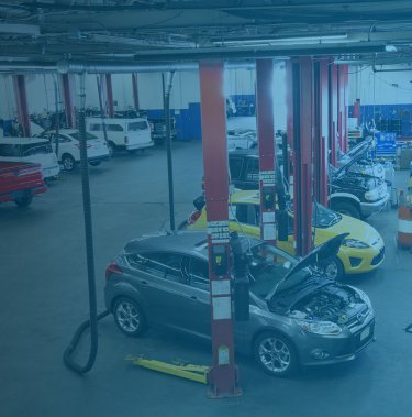 Bilar på verkstad