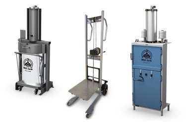 En komprimator en lyftvagn och en balpress